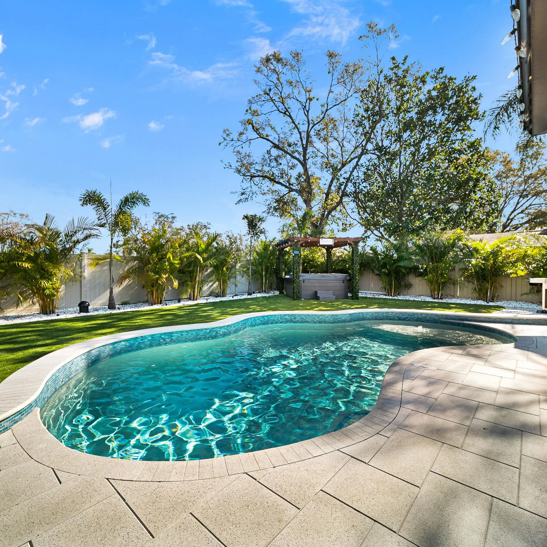 Finished concrete pool renovation by Pool Perfection in Tampa Bay