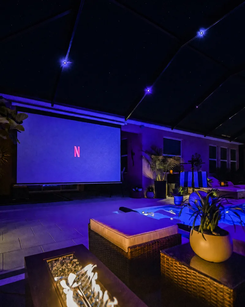 Custom pool with stone pillars, water bowls and deck jets built by Pool Perfection in Tampa